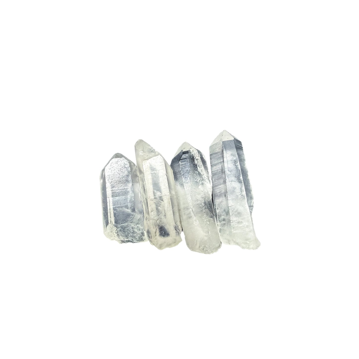 Tight crop on a few Clear Quartz points showing internal veils and natural inclusions