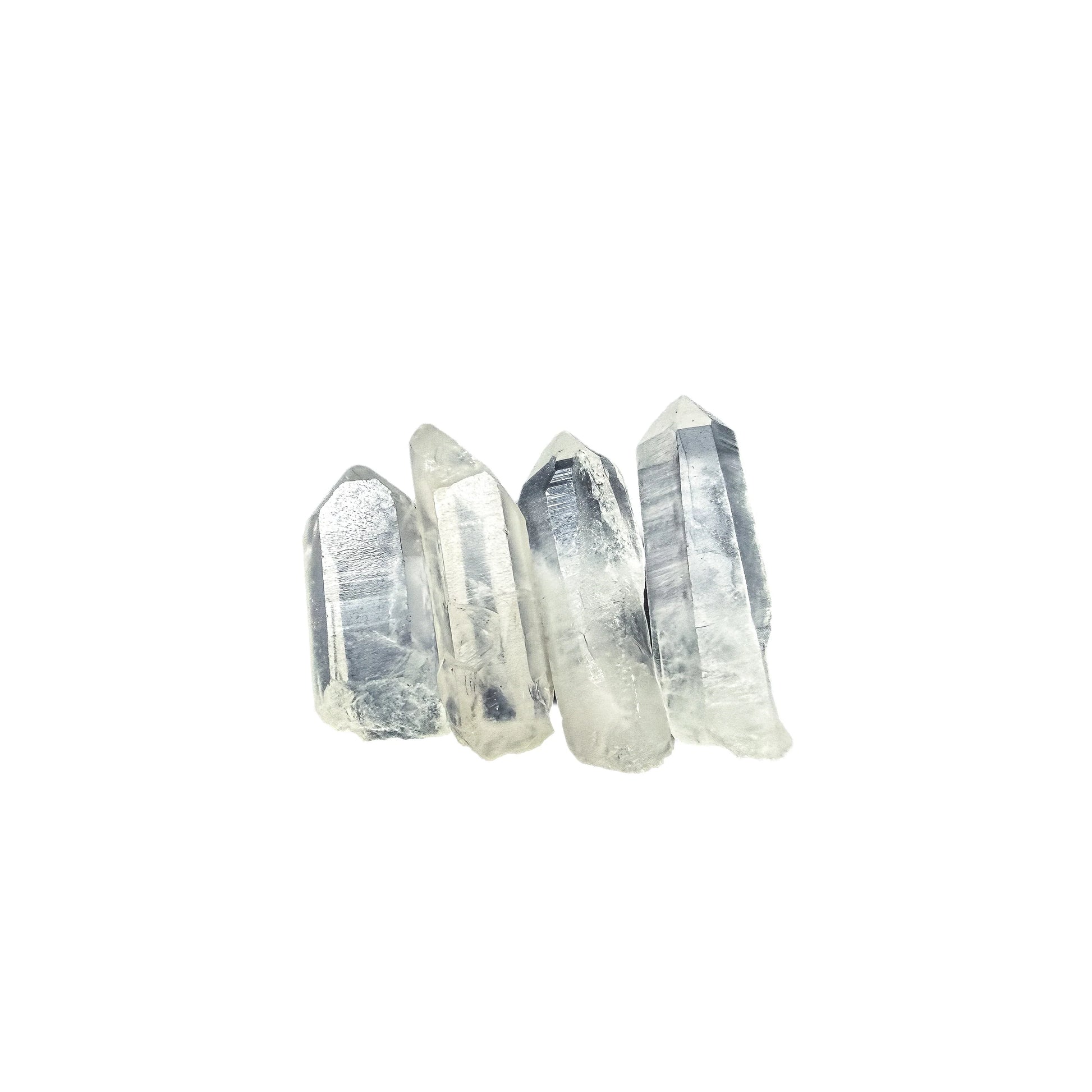 Tight crop on a few Clear Quartz points showing internal veils and natural inclusions