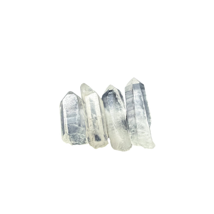 Tight crop on a few Clear Quartz points showing internal veils and natural inclusions