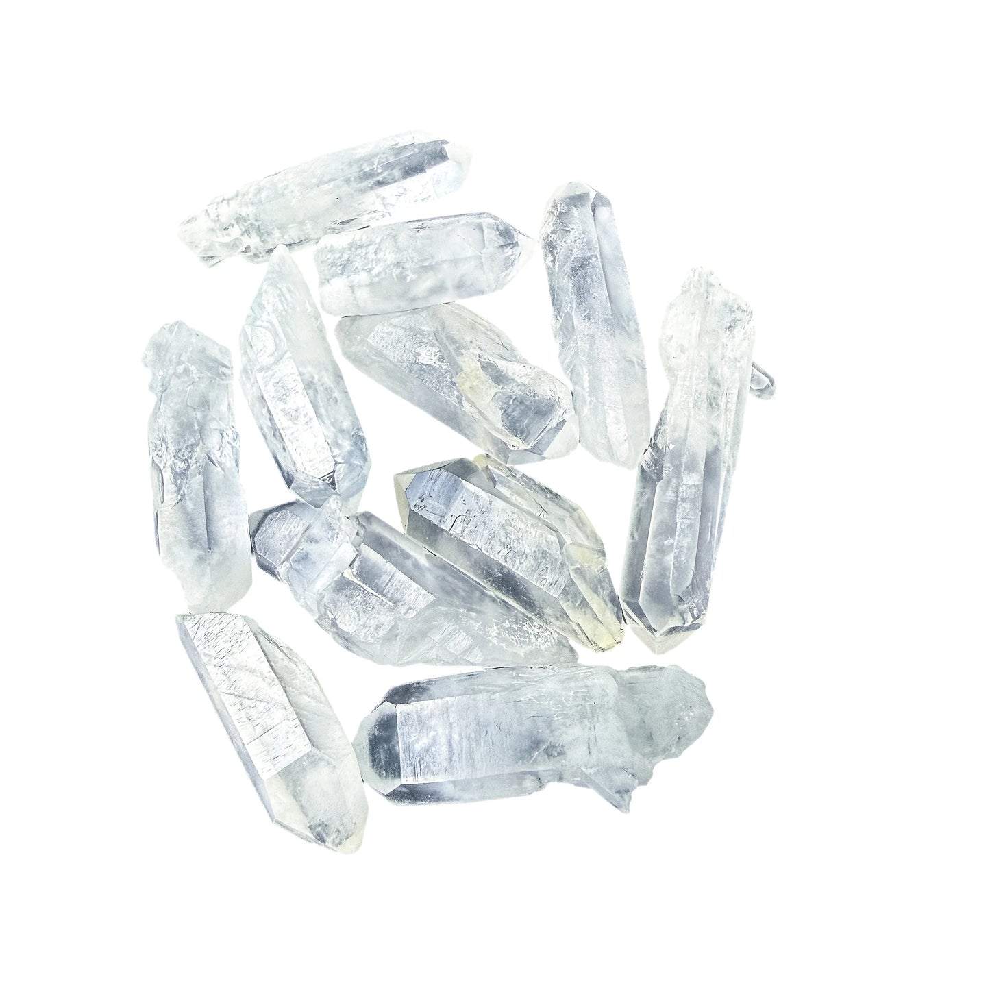 Selection of Clear Quartz points laid in a row to show length variation