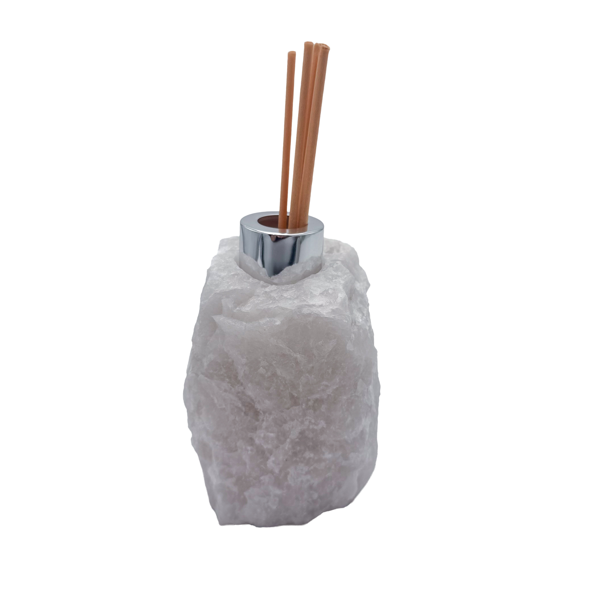 Clear quartz reed diffuser with the chrome collar and drilled opening visible at the top