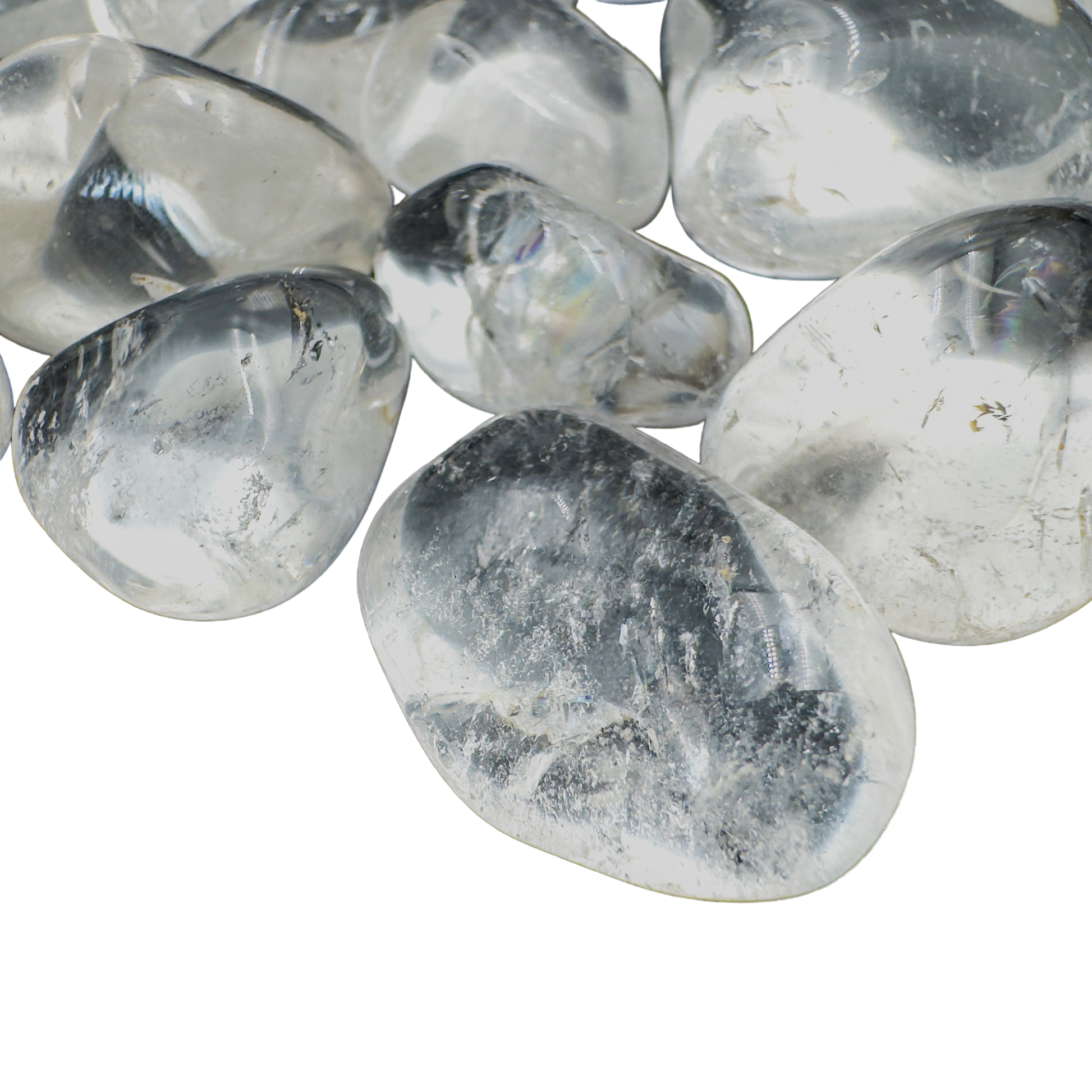 Side view of Clear Quartz tumbled stones showing deep crystalline clarity, hand-polished AAA grade from Minas Gerais