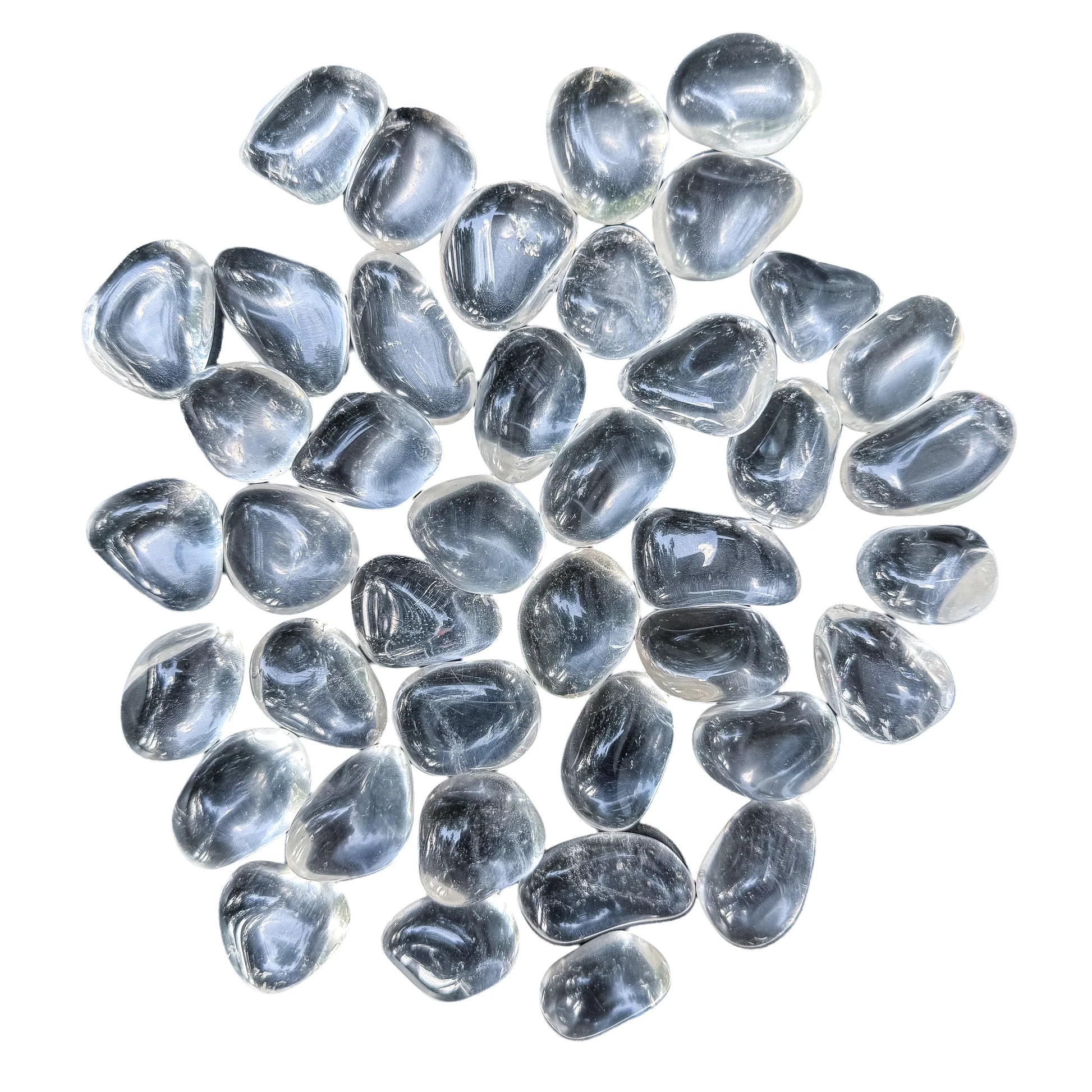 Full scatter of glass-clear Quartz tumbled stones, AAA grade, 1 to 1.5 inch, from Minas Gerais, Brazil
