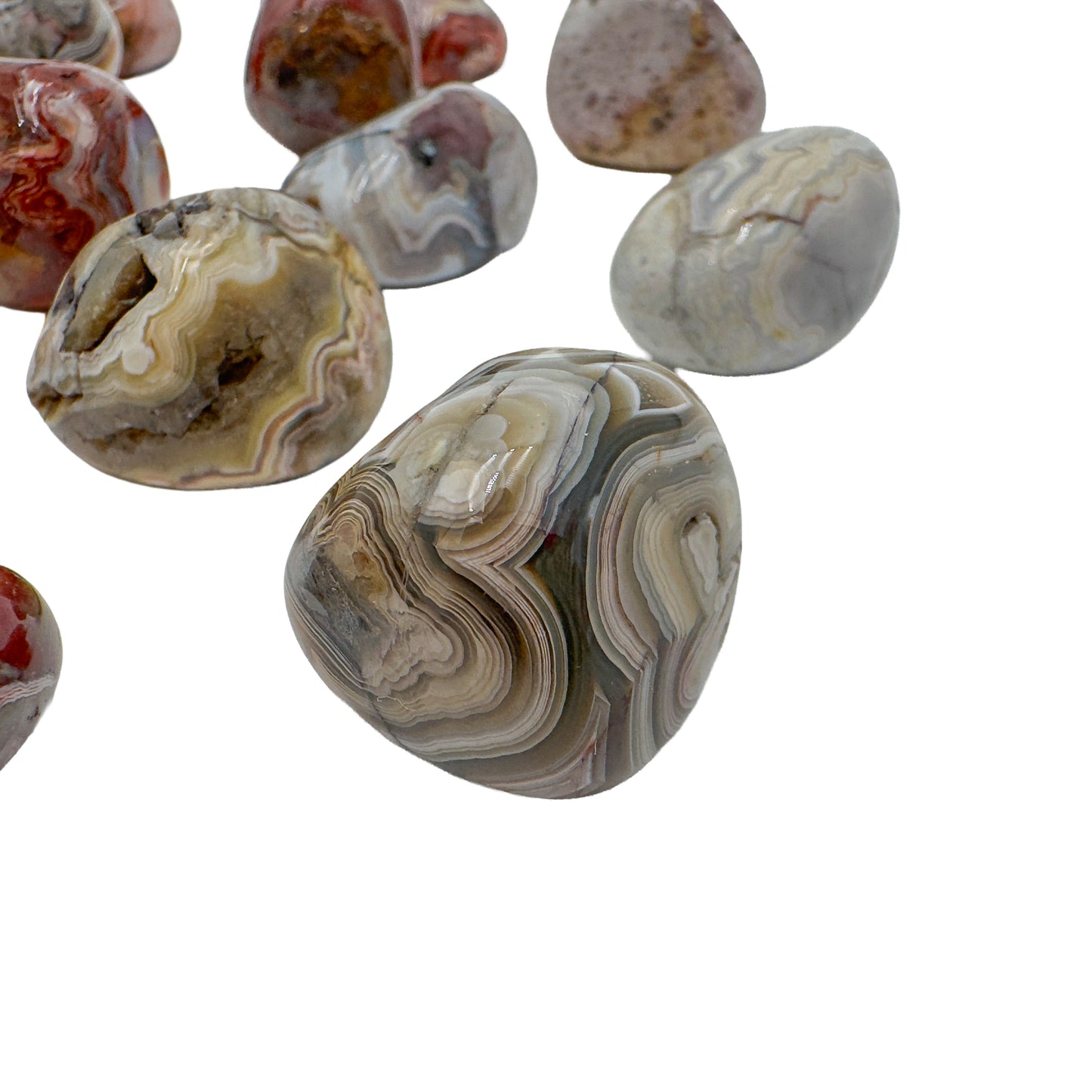 Crazy lace agate hand polished stones at 1 to 1.50 inches from Chihuahua, Mexico