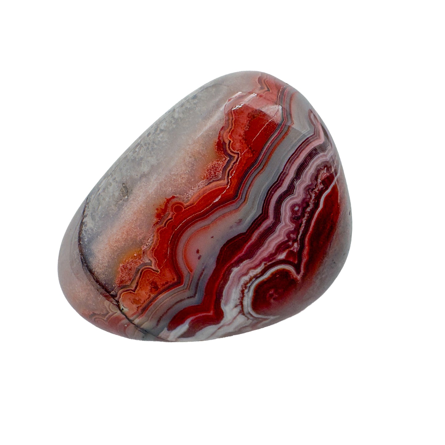 Crazy lace agate hand polished stones in warm banded earth tones, Mexico