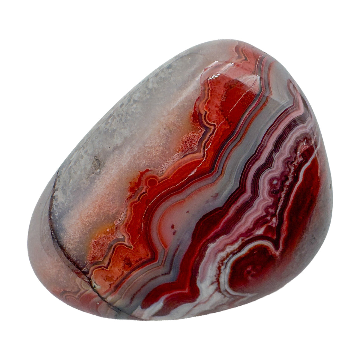 Crazy lace agate hand polished stones in warm banded earth tones, Mexico