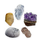 Crown Chakra Crystal Kit: clear quartz, amethyst cluster, lithium quartz point, howlite and rutilated quartz, shown together on white