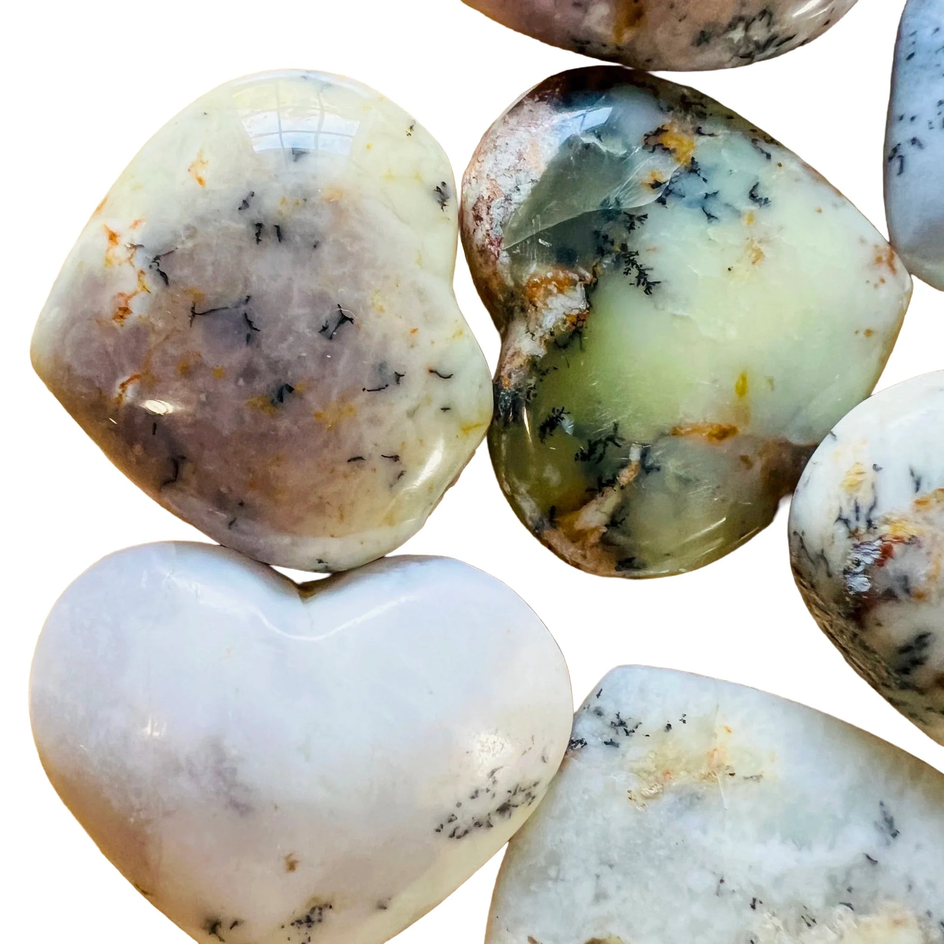 Detail shot of Grade AA Dendritic Opal heart under natural light