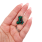 Scale shot of the fine green crust, 9.8 g of Congolese dioptase cupped in a hand