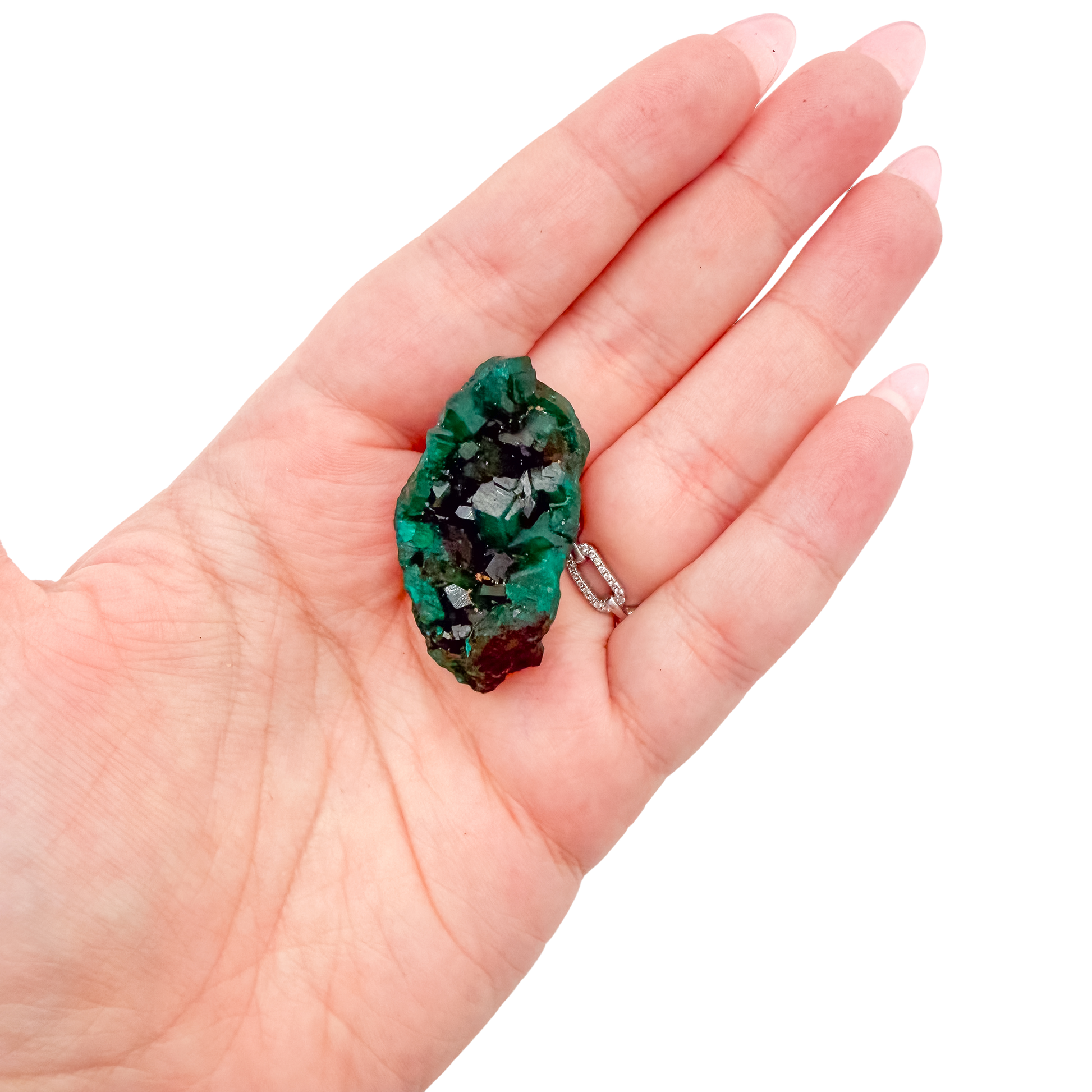 Hand holding the small square matrix to show how small a 0.78 inch collector dioptase is