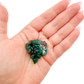Dioptase crystal specimen from the Republic of the Congo held in hand for scale, deep emerald-green druzy, specimen 15