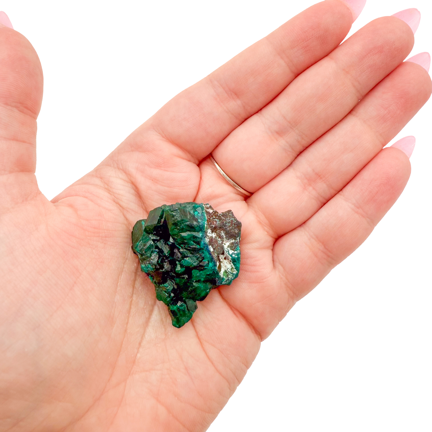 Dioptase crystal specimen from the Republic of the Congo held in hand for scale, deep emerald-green druzy, specimen 15
