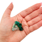 Dioptase crystal specimen from the Republic of the Congo held in hand for scale, deep emerald-green druzy, specimen 16