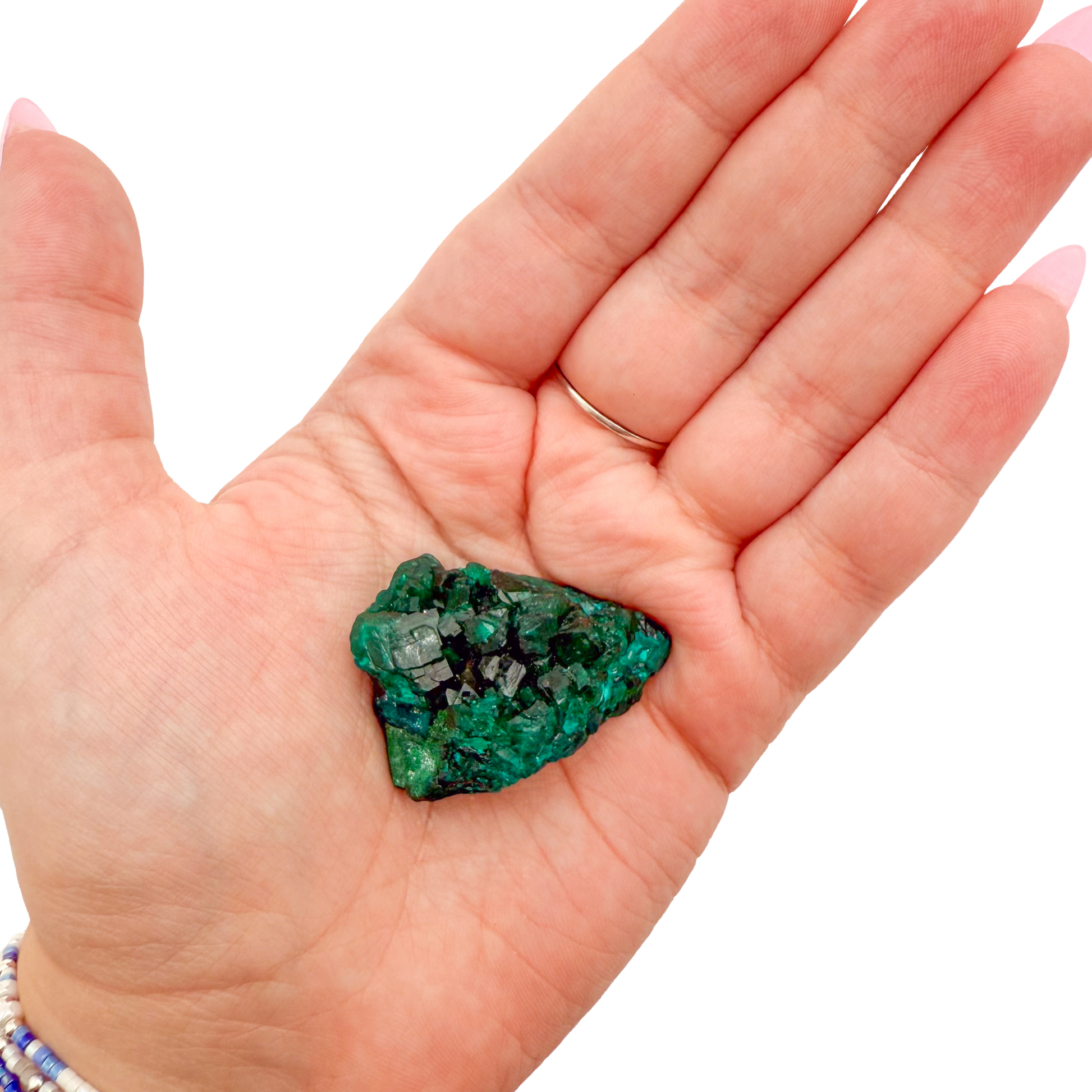Dioptase crystal specimen from the Republic of the Congo held in hand for scale, deep emerald-green druzy, specimen 6