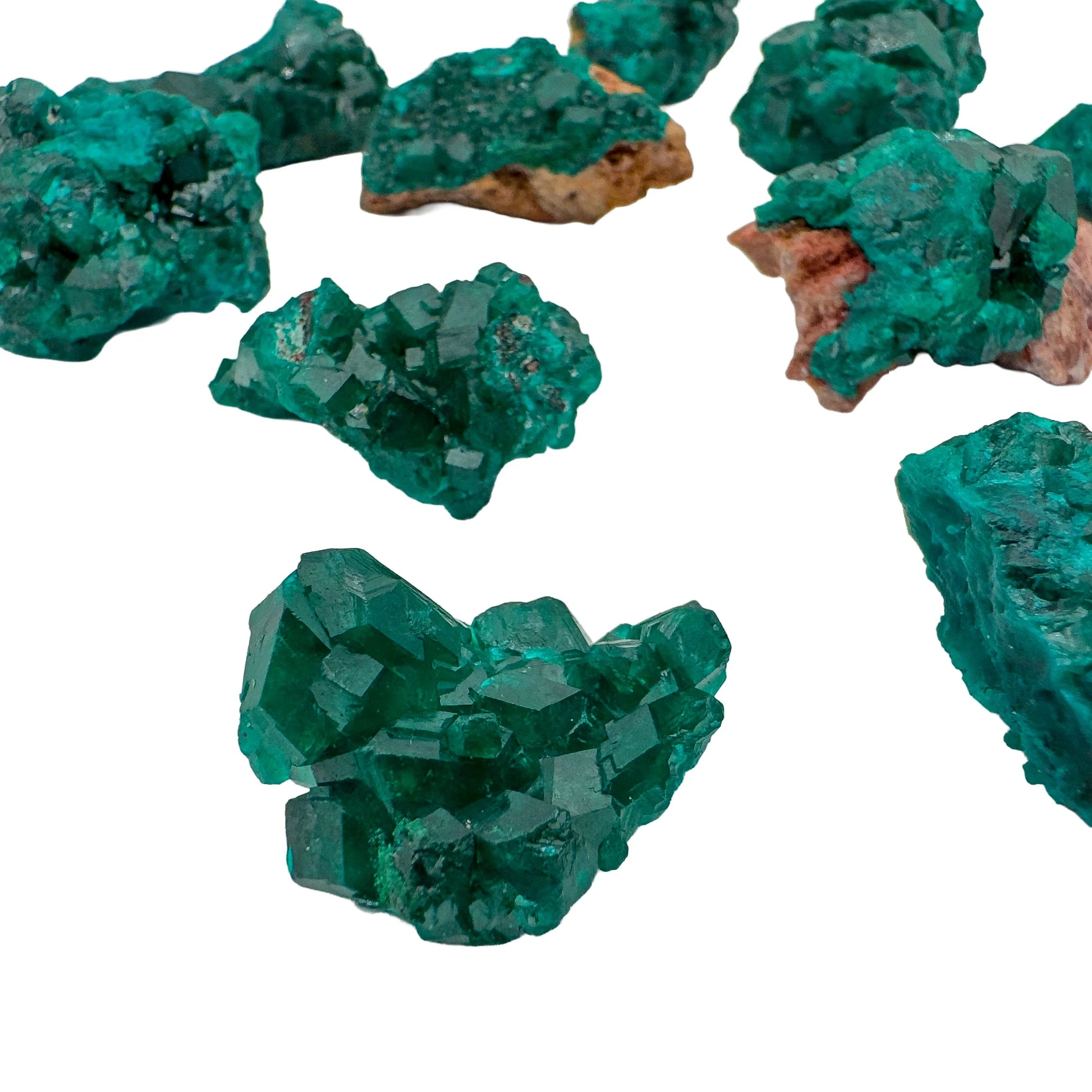 Looking down on green Dioptase raw stone, showing natural patina, from Republic of the Congo.