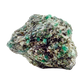 Raw emerald specimen, angled view of green beryl and silvery mica schist