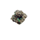 Raw emerald in matrix, side view showing green crystal pockets