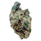 Raw emerald specimen, angled view of green beryl and silvery mica schist