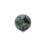 Reverse side of a hand-polished emerald sphere, 2.57 inches across, cut from Midlands Province, Zimbabwe material.