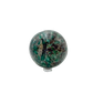The left profile of this 426 gram emerald sphere, showing the mirror finish across 65.3 millimeters of stone.