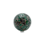 Emerald sphere photographed from the right profile, 2.57 in diameter, natural and untreated.