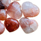 Aerial view of Fire Quartz polished heart, showing natural inclusions, Madagascar-sourced.