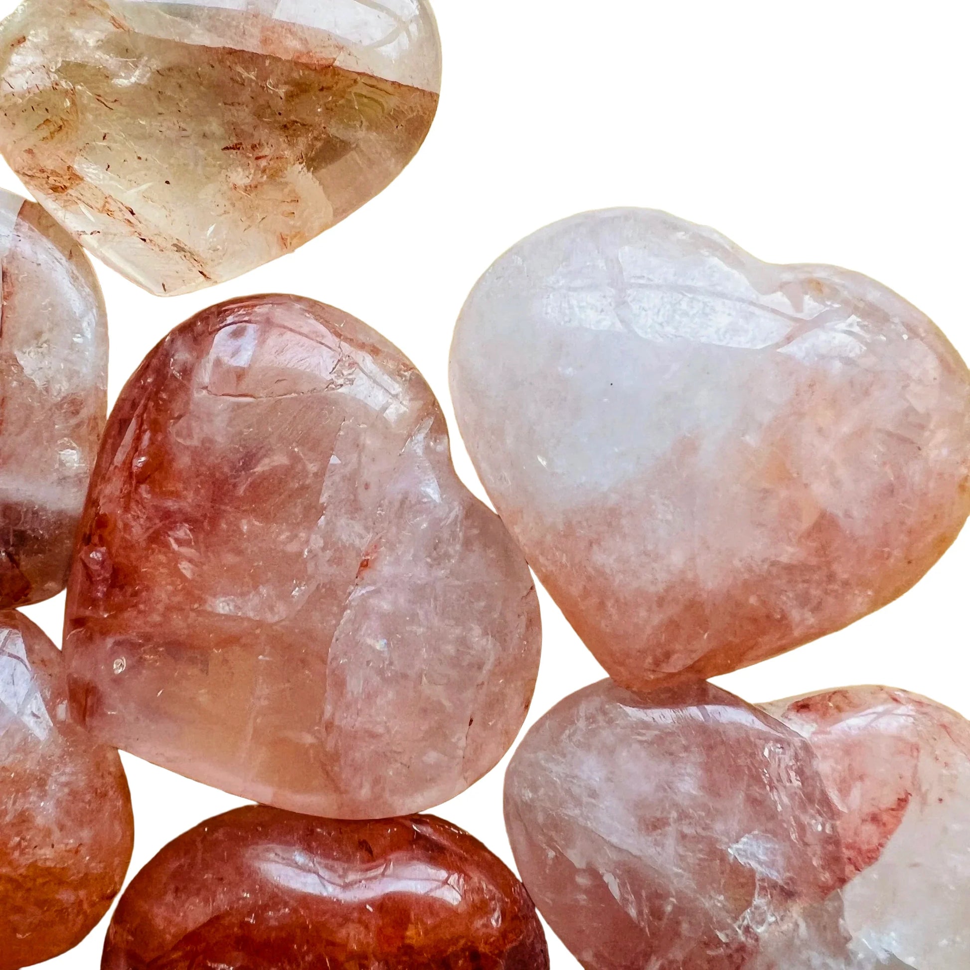 In-hand view of a Fire Quartz polished heart, from Madagascar.