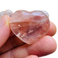 Detail shot of Grade AA Fire Quartz heart under natural light