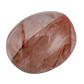 Detail view of AA Grade Fire Quartz palm stone from Alaotra-Mangoro, Madagascar