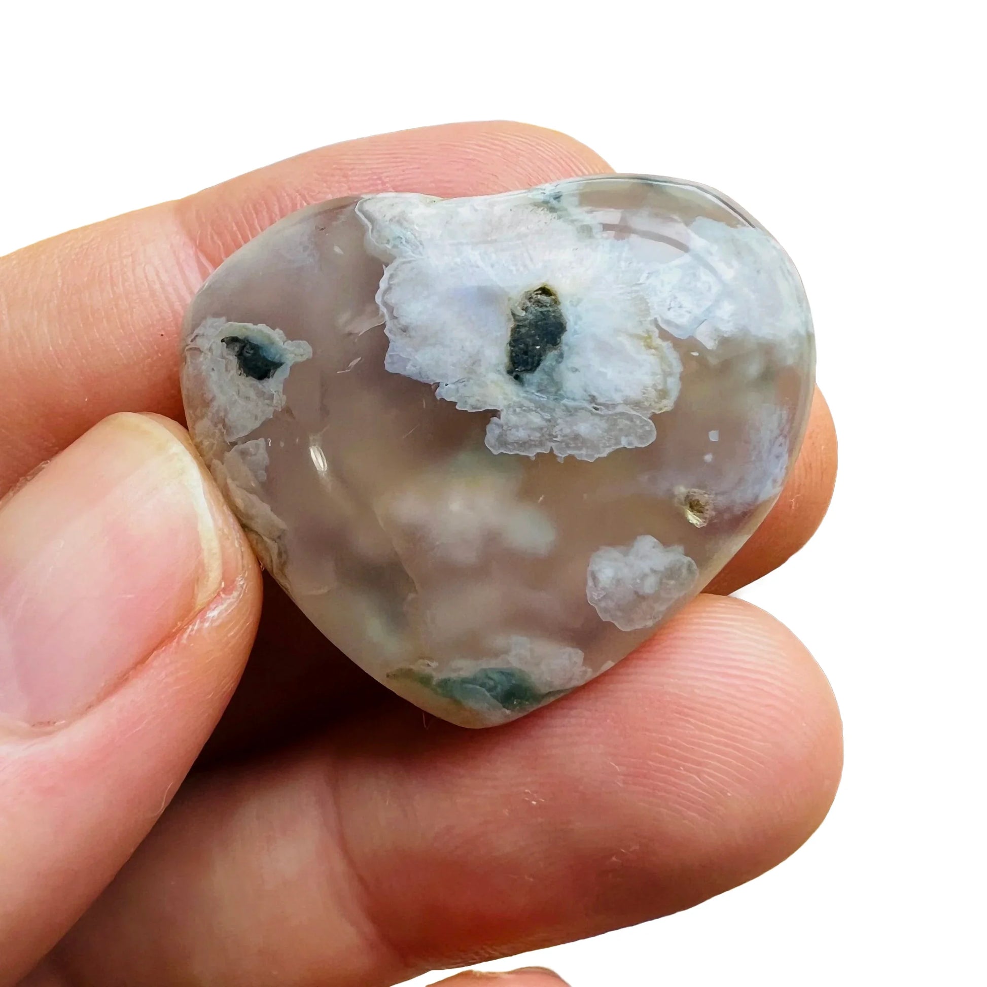 Detail shot of Grade AA Flower Agate heart under natural light