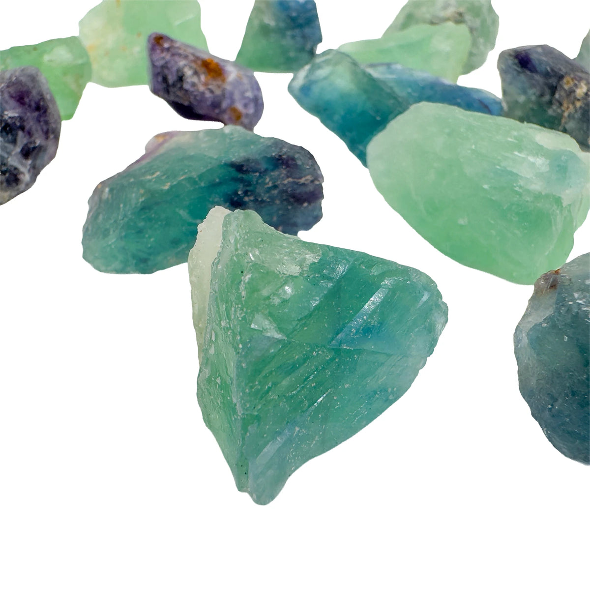Grouping of raw Fluorite, Grade AA, translucent purple and green banding