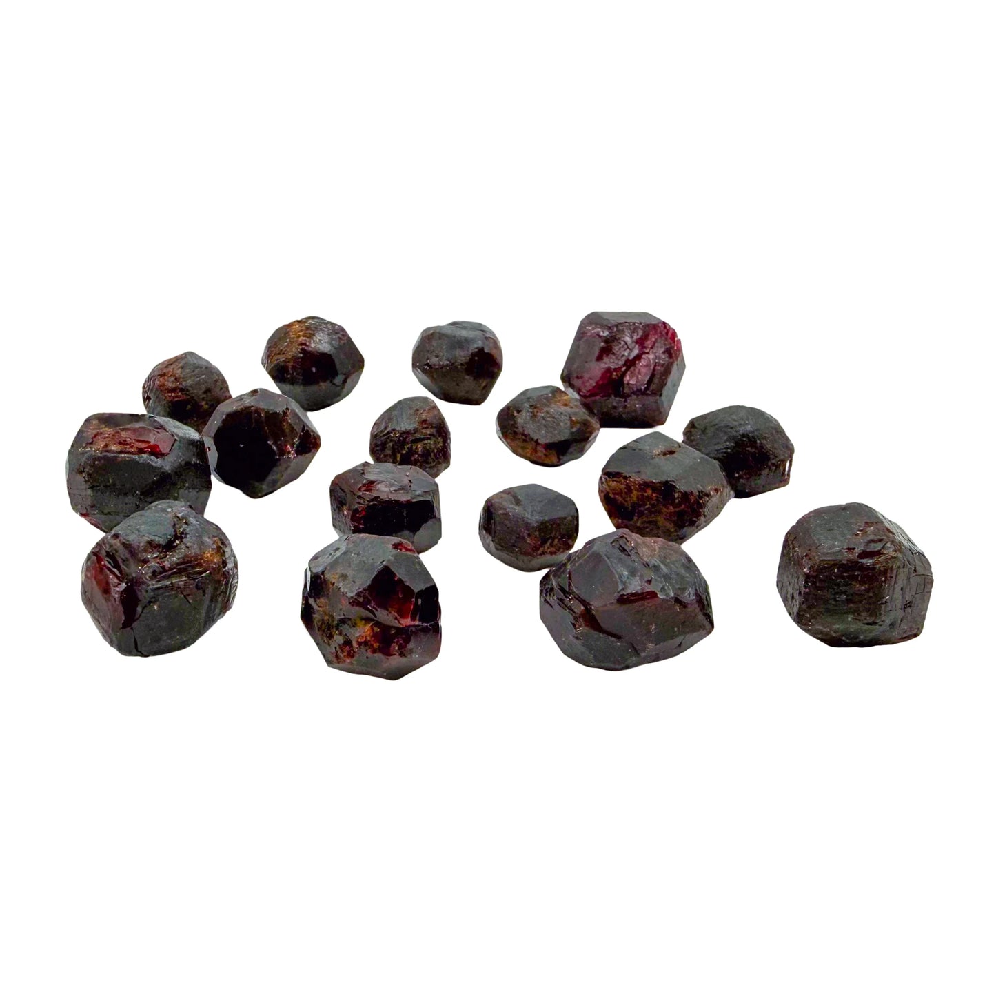 Group of raw Garnet crystals showing the natural dodecahedral faces the mineral forms in