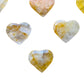 Aerial view of Golden Healer polished heart, Brazil-sourced, showing matte finish.