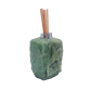 Green aventurine reed diffuser with the chrome collar and drilled opening at the top