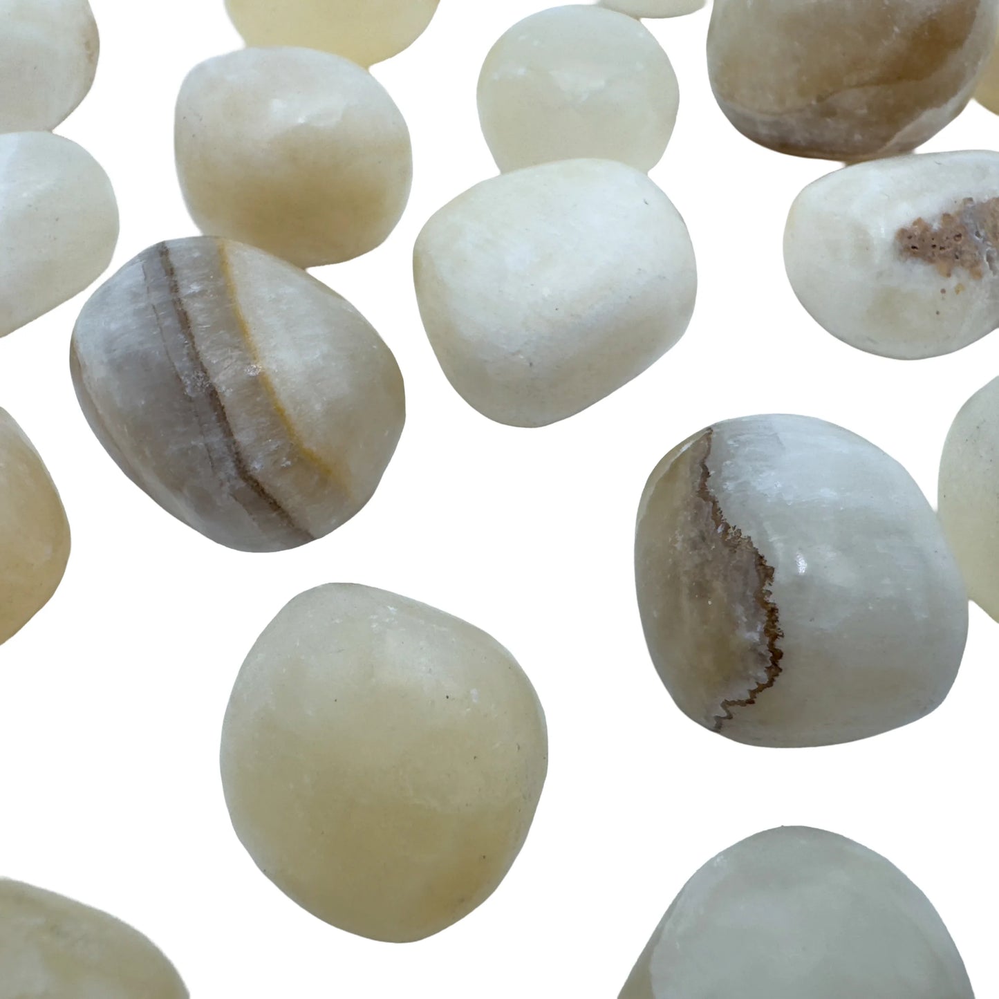 Honey Calcite tumbled stones with natural banding, AA grade from Peru