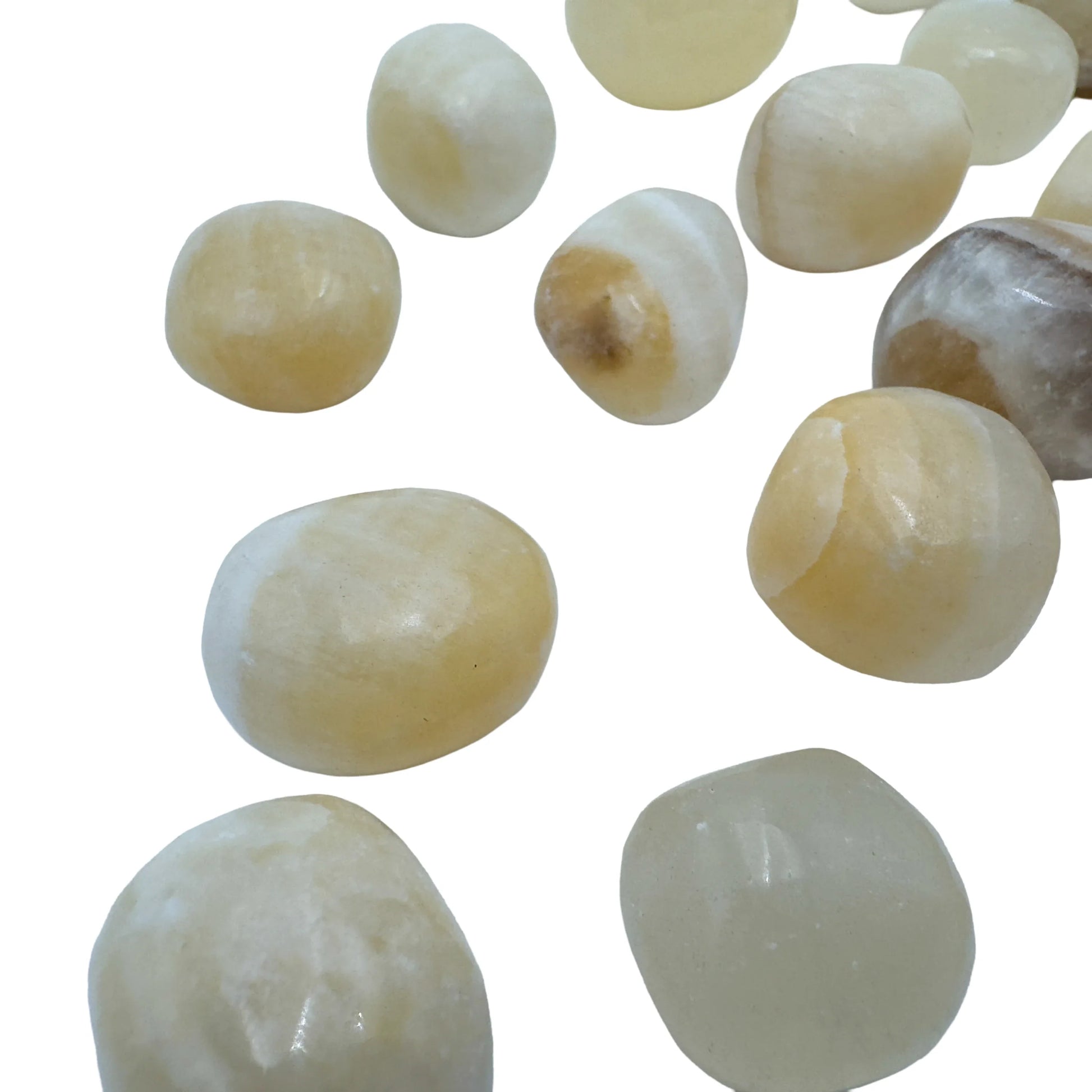 Polished Honey Calcite tumbled stone in translucent honey-yellow