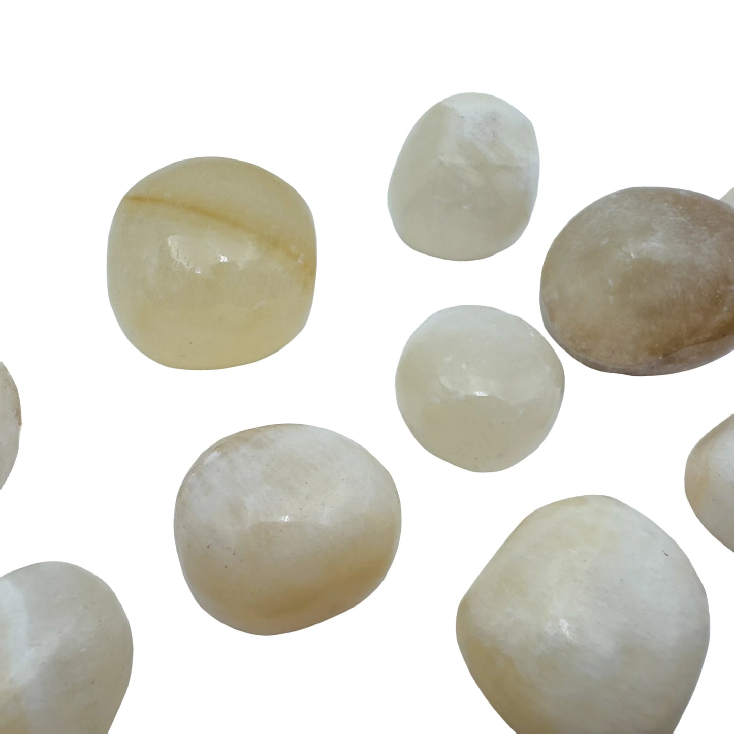 Group of golden Honey Calcite polished stones from Ancash, Peru