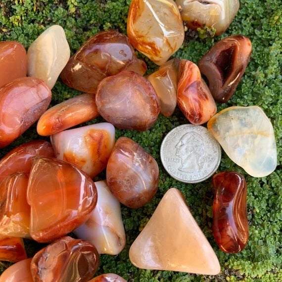 Back view of Grade AA Carnelian tumbled stone showing natural surface