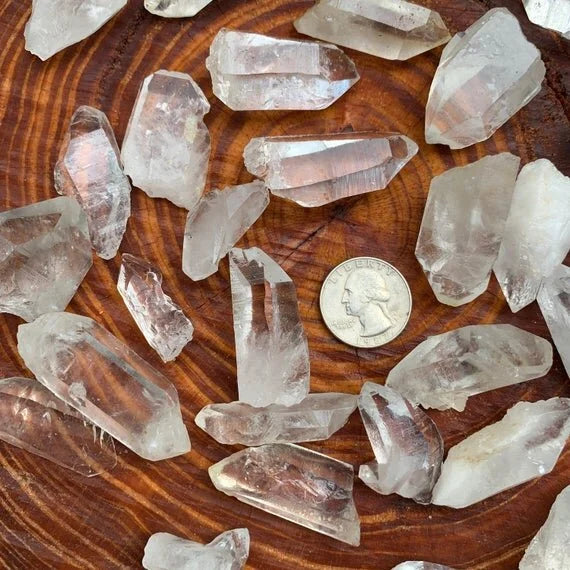 Back view of Grade AA Clear Quartz point showing natural surface