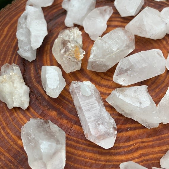 Back view of Grade A Clear Quartz point showing natural surface