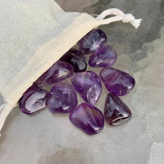 Alternate angle of purple Amethyst tumbled stone, hand-selected from Rio Grande do Sul, Brazil.