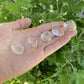 Top view of Grade AAA Clear Quartz tumbled stone, sourced from Minas Gerais, Brazil
