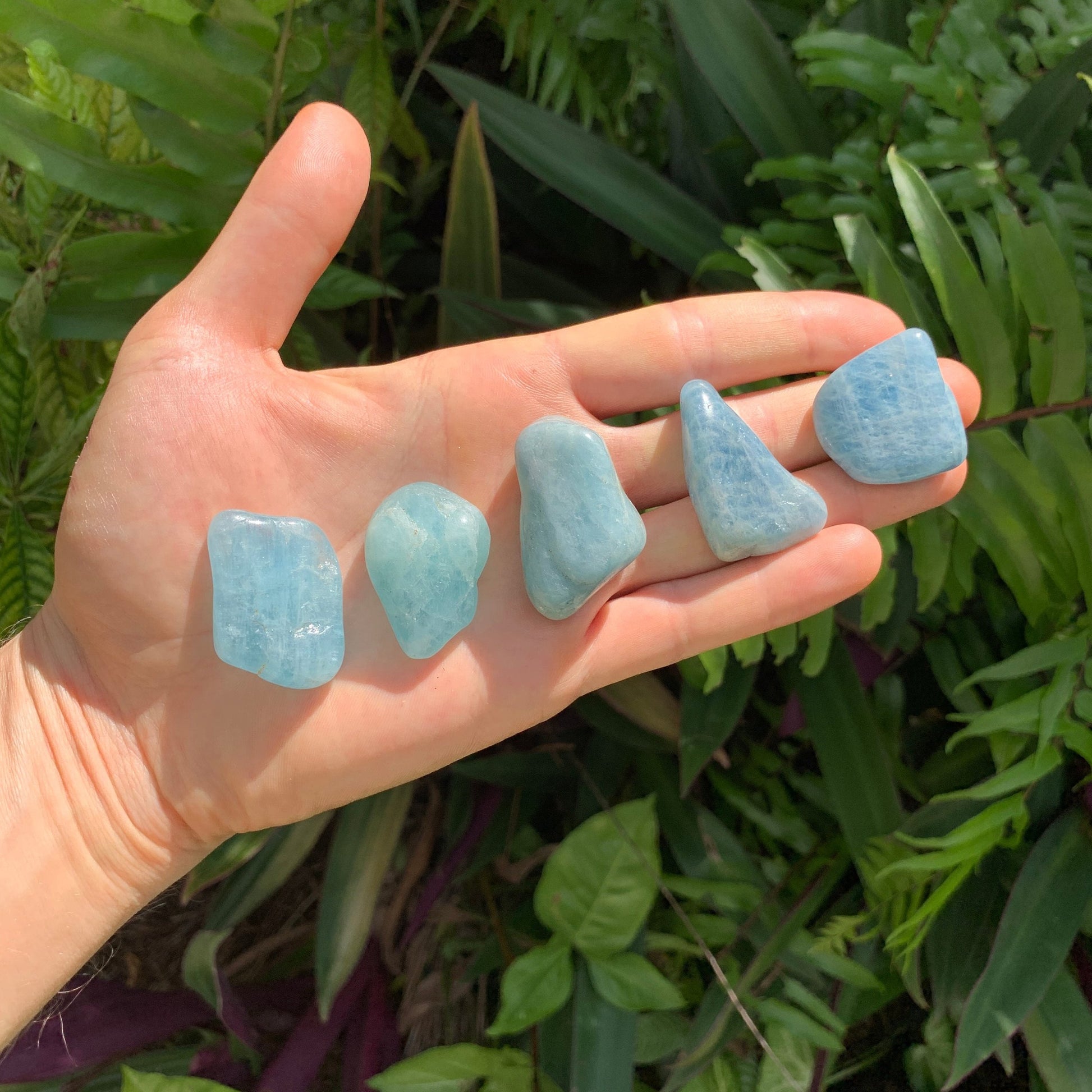 Full profile of Grade AAA Aquamarine tumbled stone ready to ship from Beyond Bohemian
