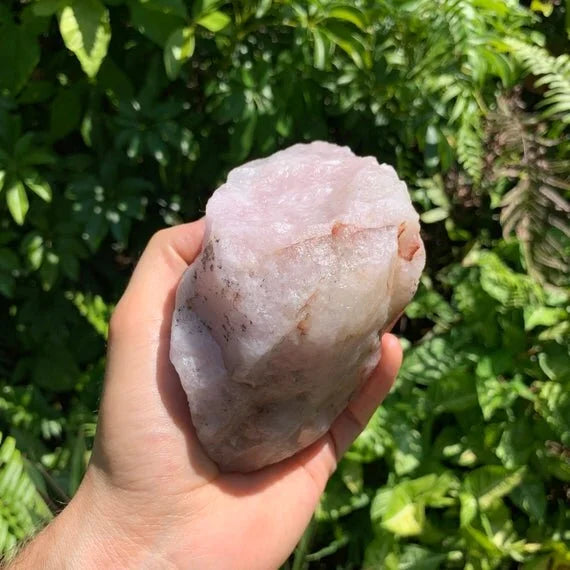 Side perspective of Rose Quartz specimen, kept close for Love and Self Love, from Madagascar.