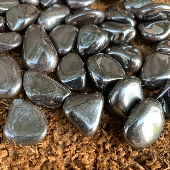 Close-up of Hematite tumbled stone from Brazil, soothing wellness stone for Stress Relief