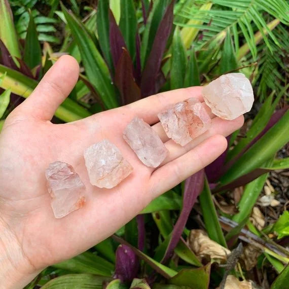 Worktop view of Fire Quartz raw crystal, from Alaotra-Mangoro, Madagascar, often kept for Focus, with subtle natural color showing through.