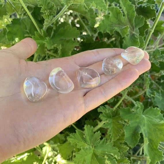 Alternate angle of Grade AAA Clear Quartz tumbled stone showing overall shape