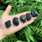 Bird's-eye view of Black Tourmaline raw stone, linked to Protection.