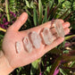 Detail shot of Grade AA Lemurian Quartz point under natural light