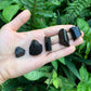 Back view of Grade AA Black Tourmaline raw showing natural surface